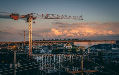 beautiful-view-construction-site-city-sunset_181624-9347